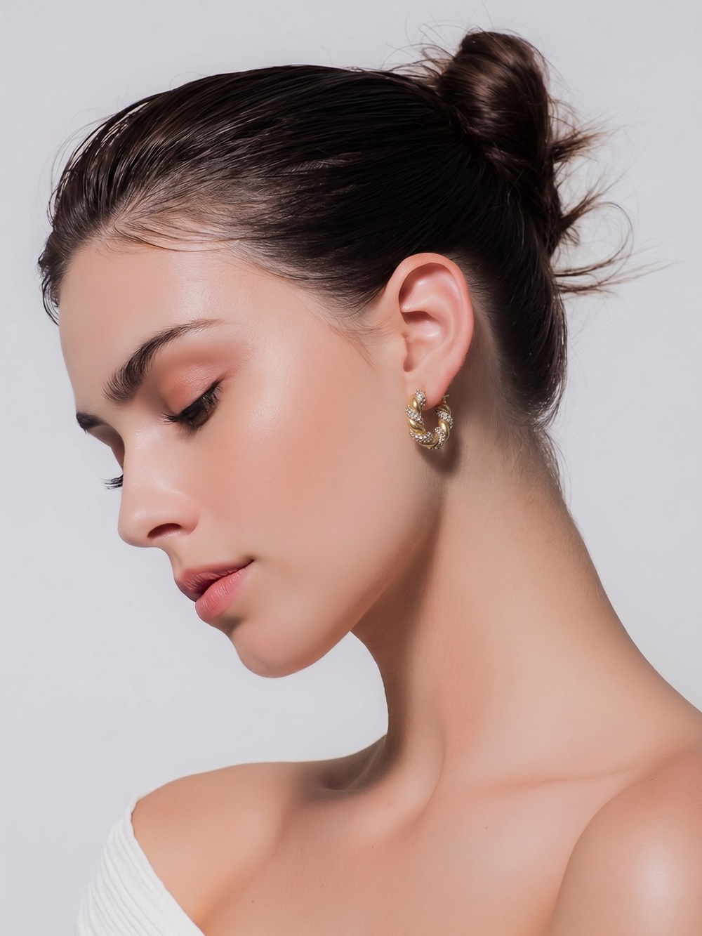 Madison Gold Twisted Hoop Earrings with Crystal Detailing